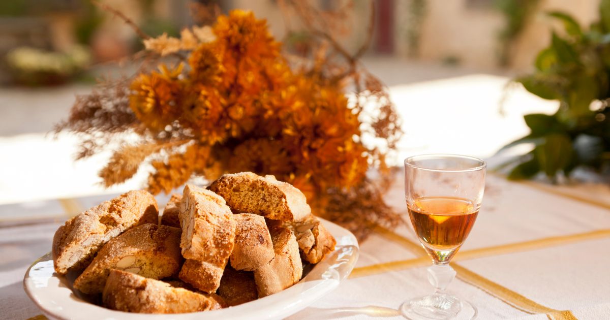 Almond cantucci with a glass of Vin Santo.