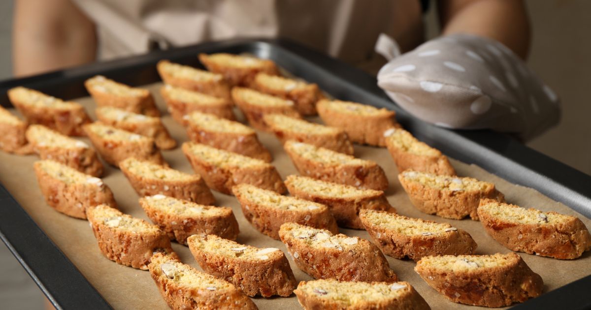 Cantucci sliced on the diagonal with whole almonds.